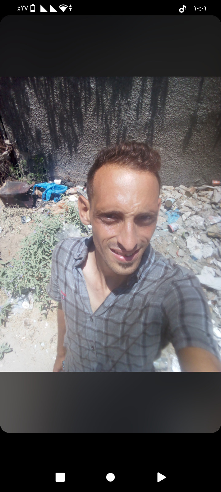 I Am Ahmed Al-Nabih From Gaza. I Am 33 Years Old And Married. This Is My Mother. She Is 65 Years Old.
