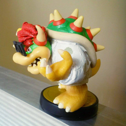 thekumazone:  dogfu-draws-dicks:My Kyary Pamyu Pamyu inspired Bowser Amiibo!!!So Bowser is totes the bae, that I HAD to customize him to look kawaii af!Not sure if ya’ll interested in how I did it, but I basically cooked the sculpey clay ON the Amiibo