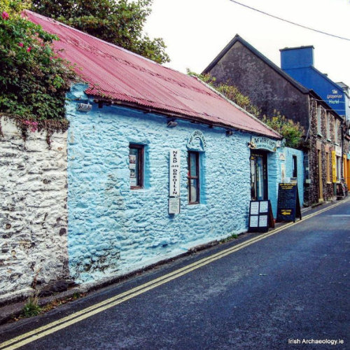 irisharchaeology:Red galvanised-iron roof and blue rinsed stone walls, a traditional building, Dingl