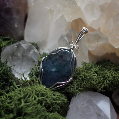 90377: 90377:Wonderful moss agate and lovely amethyst with a tiny rainbow inside. Both wire wrapped 