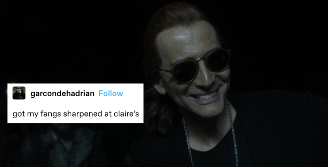 crowley in hell. his long hair is pulled back and he's grinning toothily. a text post next to him reads: got my fangs sharpened at claire's