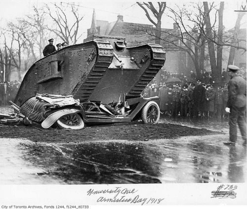 error888:Tank crushing car in Victory Bond drive, University Avenue (by Toronto History)