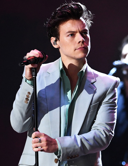 harrystylesdaily - Harry Styles performs on the runway during...