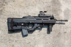 gunrunnerhell:  FN FS2000One of the more recent models with the picatinny sight rail and tri-rail handguard. Very early FS2000′s have what some FN owners call the “Plastic Pot of Gold”; the Gen 1 trigger packs were equipped with an auto-sear. These