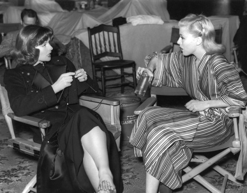 Katherine Hepburn and Ginger Rogers enjoying some downtime on the set of Stage Door, 1937