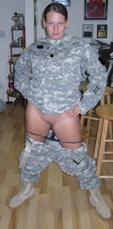 militarysluts:  Army SSG strips out of her uniform and sucks dick.