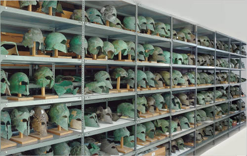 museum-of-artifacts:Ancient Greek Helmets, Classical Period, From Olympia Museum Store Room You want