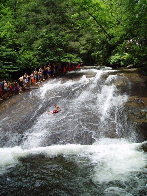 southernwaterways:  sliding down Sliding Rock in the Pisgah National Forest, near Brevard, NC  I found my own sliding rock in NC. It’s bigger and you can slide down faster cuz you ain’t gotta wear clothes. It’s one of my favorite spots