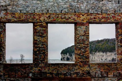 destroyed-and-abandoned:  View through the Fayette General Store overlooking Lake Michigan Source: umichscoots (reddit)