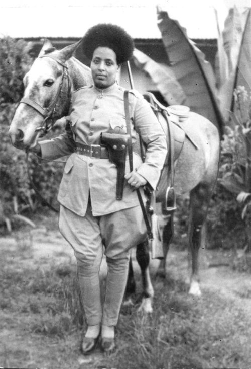 historicaltimes - Ethiopian female soldier preparing to fight...
