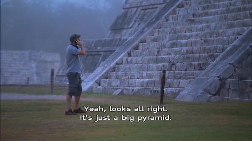 wenchyfloozymoo: Karl explaining how to play a DVD to Suzanne while at the Chichen Itza.