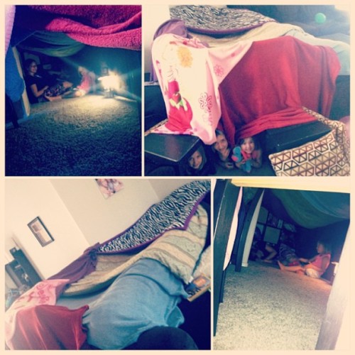 Just playing in our giant fort that mom made…#nbd #fortfun #fort #blankets #lantern #sisters 