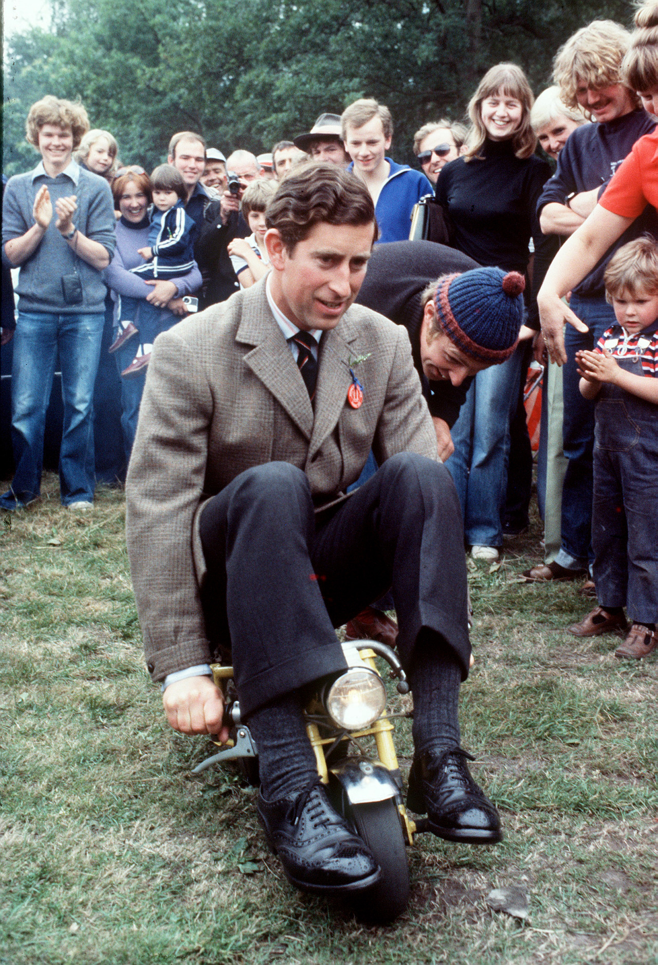 Norfolk Coats And Over-the-Calf Socks Of 1978.
King Charles.