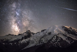 sixpenceee:  “Ascent of Angels”, by Brad Goldpaint, USA  “Following his first up-close encounter with a black bear, the photographer was relieved to reach his destination safely and capture this phenomenal image. A meteor can be seen piercing through