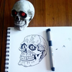 Skull with dotwork shading. Possibly going