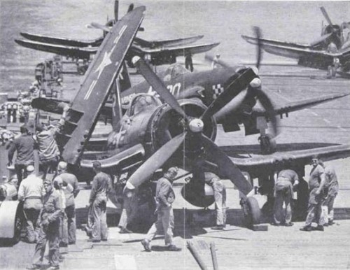 usaac-official:F4U-4s of VMF-312 prepare for a mission aboard USS Bataan (CVL-29) during a deployment to Korea, spring 1952