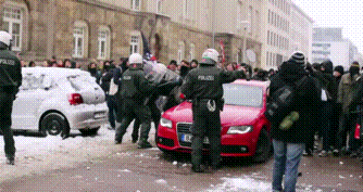 kropotkindersurprise:  2013 - Antifascists break through police lines to block a