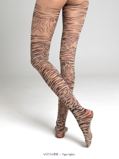 Tiger tights with stripes  Stripes and tiger heads print on brown SEMI-OPAQUE tights.The material is