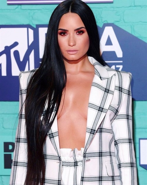 DEMI LOVATO’S TITS HANGING OUT AT THE MTV EMAS - 2017