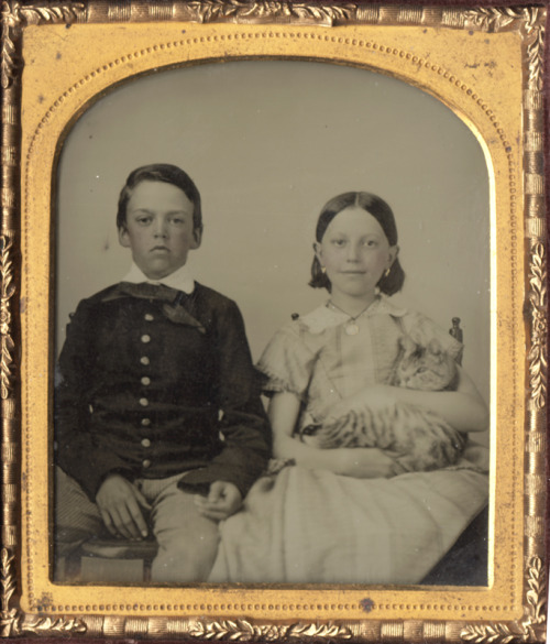 ca. 1855-60s, [ambrotype portrait of two children; the girl on the left apparently very pleased with