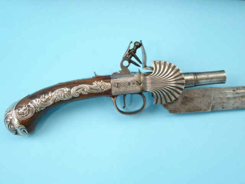 A silver mounted flintlock sword pistol combination.  Made by Griffin and Two of London, 18th centur