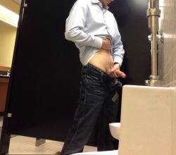 undrscr69:  Showing my cock in a public restroom.