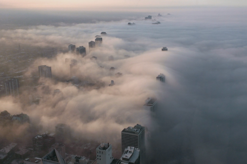 nubbsgalore:advection fog over chicago, formed as warm, moist air condenses as it moves over the col