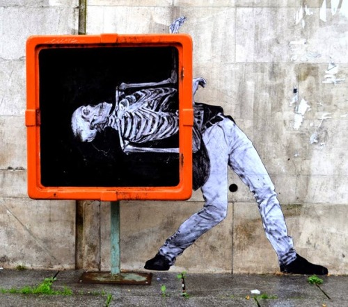 asylum-art-2:The infernal machine – The latest street art creations of french artist Levalet Here a