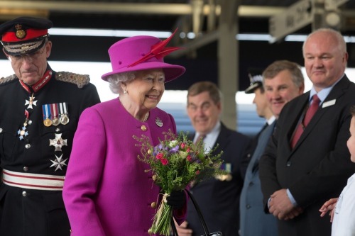 Queen Elizabeth II arrives at Plymouth Railway Station as she visits the city on March 20, 2015 in P