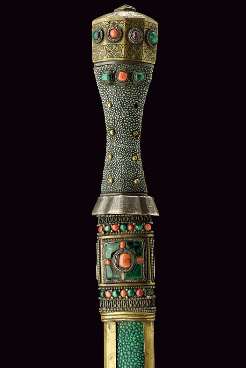 art-of-swords:  Tsep-sa Sword Dated: 19th century Culture: Tibetan Measurements: overall length 45 cm The sword features a straight, single-edged blade of typical shape, with a hollow brass quillon with external silver plating. The grip is covered with