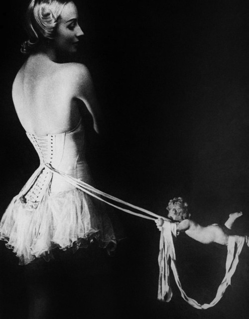 August, 1939: The Mainbocher corset, photographed for Harper’s Bazaar by Erwin Blumenfeld http