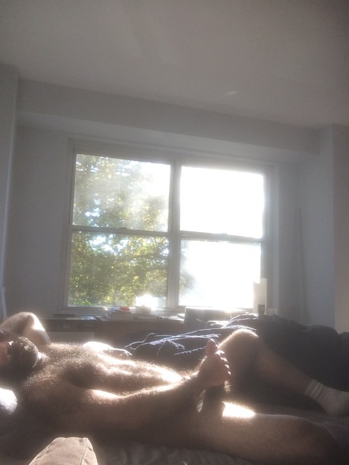A bearded, hairy Father on a Saturday morning, thinking about his son in the next room. sex-emotions
