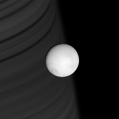 spaceexp: Enceladus with Saturn in the Backdrop