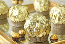 jessipalooza:  yumi-food:Giant Ferrero Rocher Hazelnut Mousse Cakes  holy shit