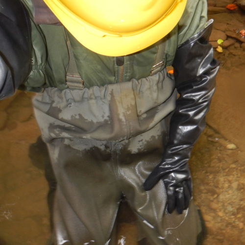 Very old and super-heavy chest waders. Like the sewer workers had them in the 1970s or 1980s. I don’