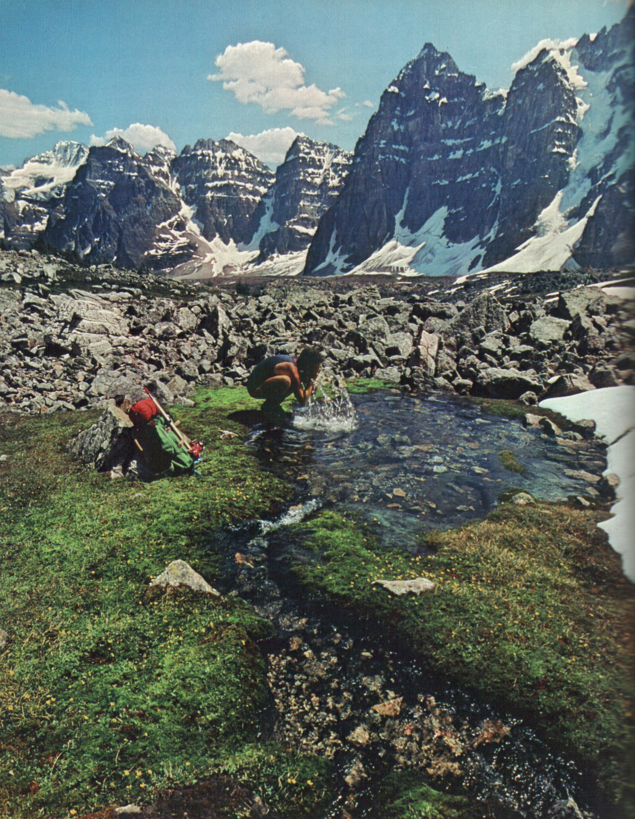 the-hippie-movement:  vintagenatgeographic:  A hiker stops to refresh in the Valley