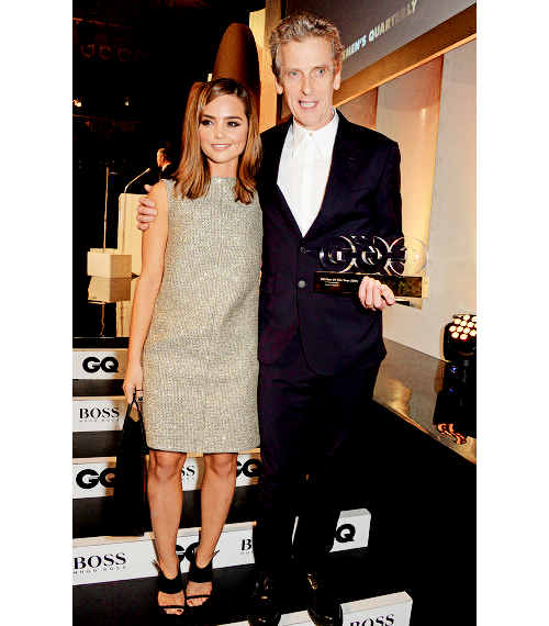 fyjennalouisecoleman:  Jenna Coleman and Peter Capaldi, winner of the TV Personality of the Year award, attend the GQ Men Of The Year awards in association with Hugo Boss at The Royal Opera House on September 2, 2014 in London, England. 