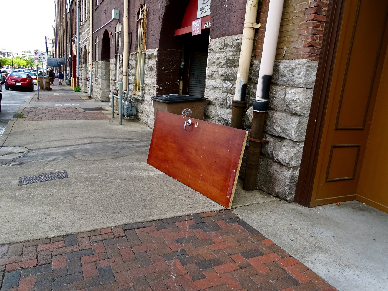 Unhinged
oddly, a single door on its side on a Nashville, TN sidewalk / Julie Cook / 2015