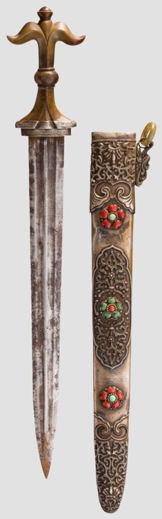 Tibetan short sword with mounted red coral and turquoise.from Hermann Historica