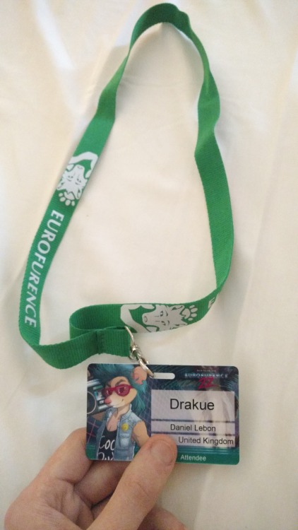 Here’s some EF pictures! Some more, I mean. In order of appearance: The beautiful Eurofur bannersAnother 80′s inspired furry banner, myself lounging on the (not estrel) hotel bedMy badge! A default one with no unique art, but I love the rocker mouse,