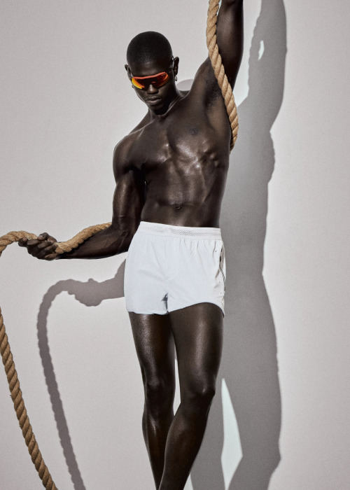 vogueman:  Omar Sesay photographed by Isaac Anthony for WWD. Omar wears Nike Show x Rush injected sunglasses and Ten Thousand Things white polyester shorts