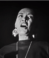 black0rpheus:Billie Holiday performing on the French television program Music Hall Parade in Paris, 