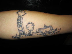 fuckyeahtattoos:  Calvin and Hobbes done by Phil Szlosek at Kings Ave Tattoo in LI.
