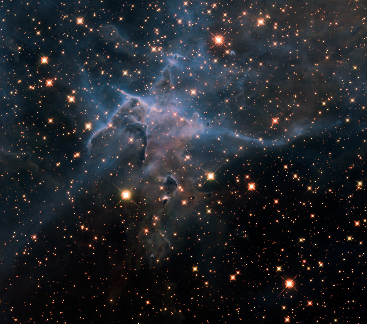 just–space:  Hubbles wide view of Mystic Mountain in the infrared  js 