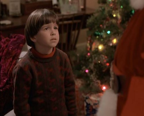 The beauty of this brown and red reindeer sweater made Charlie cry in this scene from the great 90s 