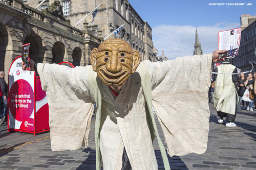 Performers promoting their show on The Royal Mile during the Edinburgh Fringe Festival