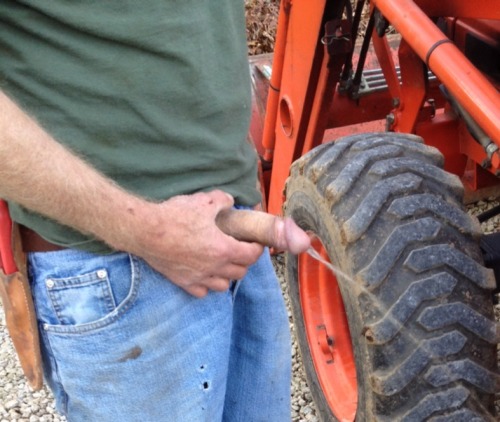 bluffman59: Pissing by the tractor