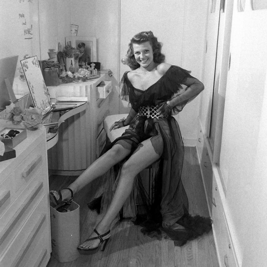 Rita Hayworth photographed by Peter Stackpole for LIFE magazine at home in Beverly Hills, 1945.