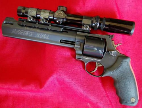 gunrunnerhell:  Taurus Raging Bull 454 A large revolver chambered in the .454 Casull, very potent and effective for hunting. The finish is the rather uncommon matte black; usually Raging Bulls are a matte stainless steel or blued. Note that under the