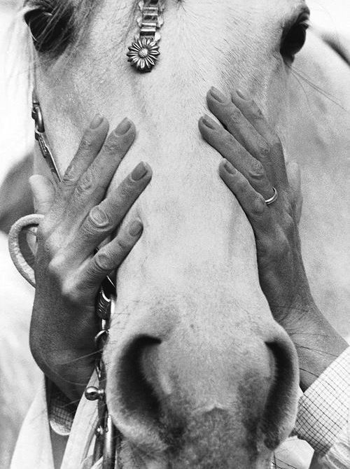 solarbar:  Spanish bullfighter and equestrian Conchita Cintrón holding the head of her Arabian hors
